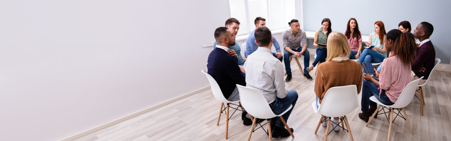 Multi-ethnic People Sitting In Circle Counseling